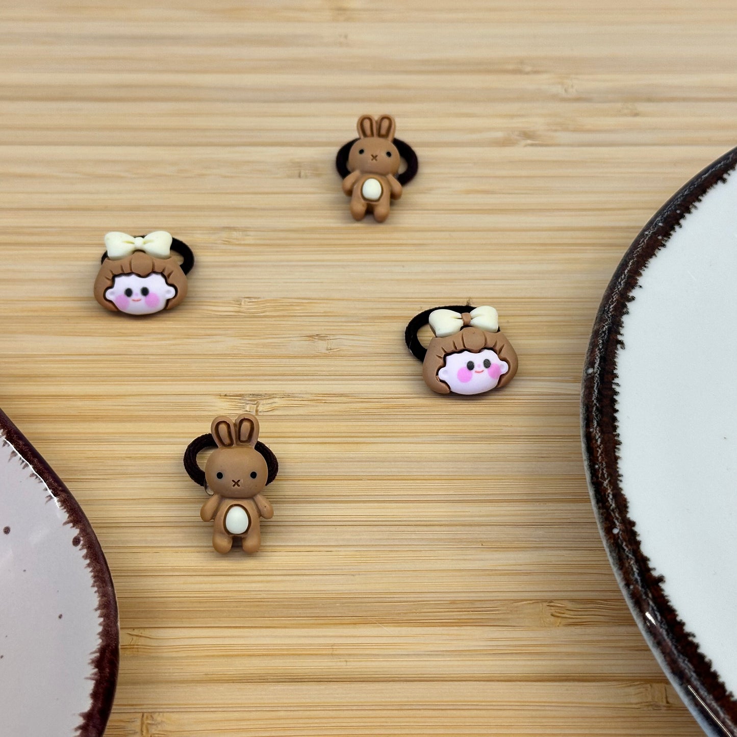 Žaismingos vaikiškos gumytės su mergytėm ir zuikučiais - Plaukuota-gumelės