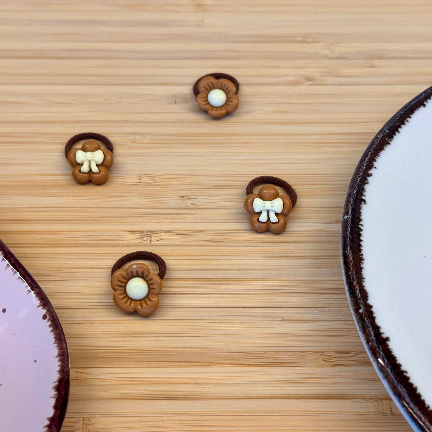 Žaismingos vaikiškos gumytės su gėlytėmis ir kaspinėliais