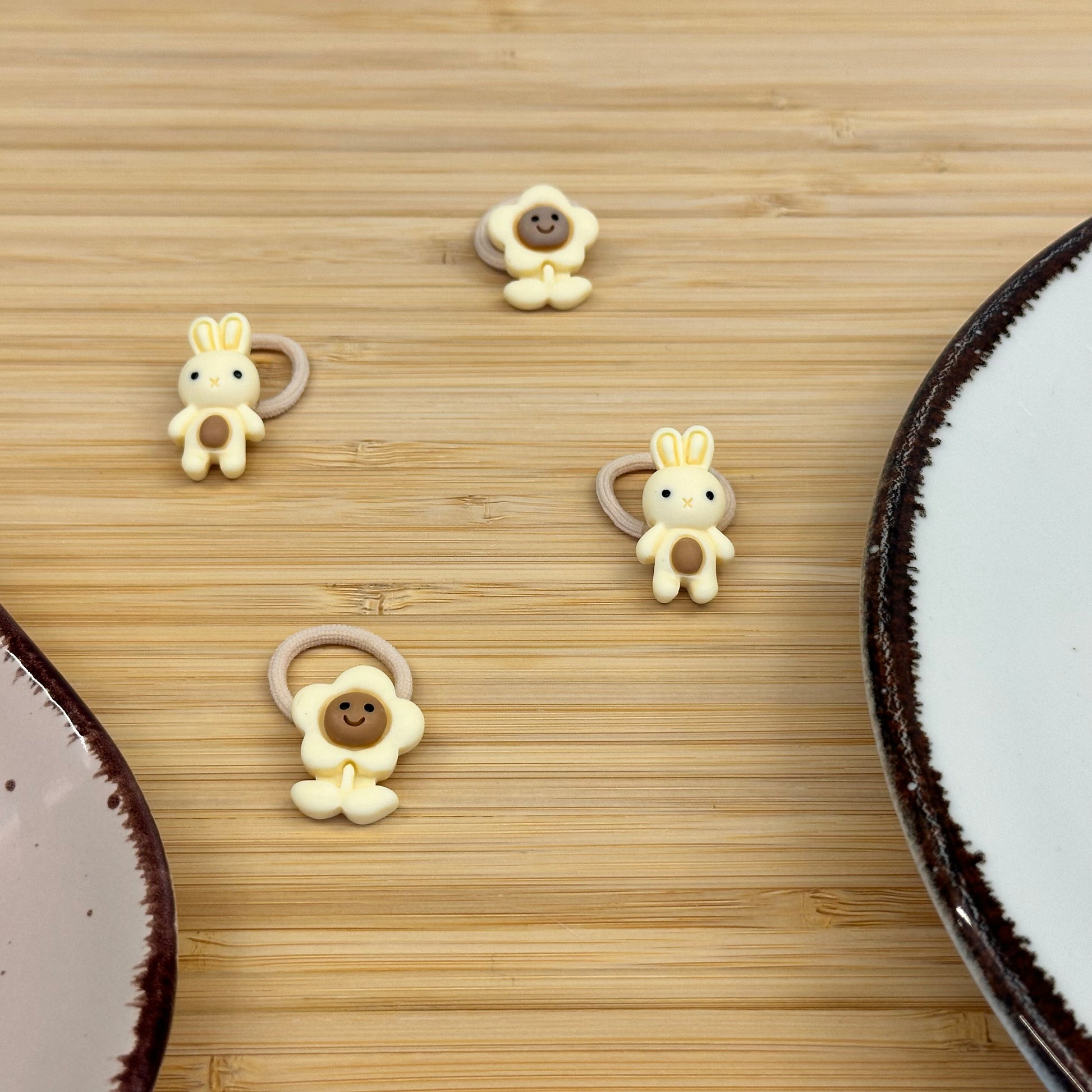 Žaismingos vaikiškos gumytės su zuikiais ir gėlytėmis