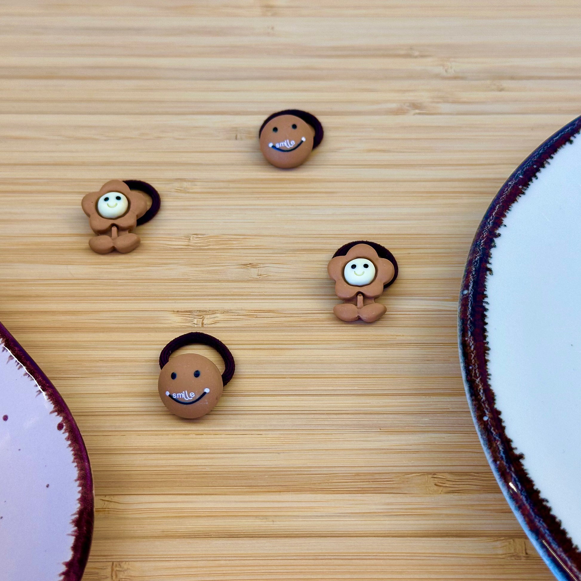 Žaismingos vaikiškos gumytės su gėlytėmis ir šypsenėlėmis