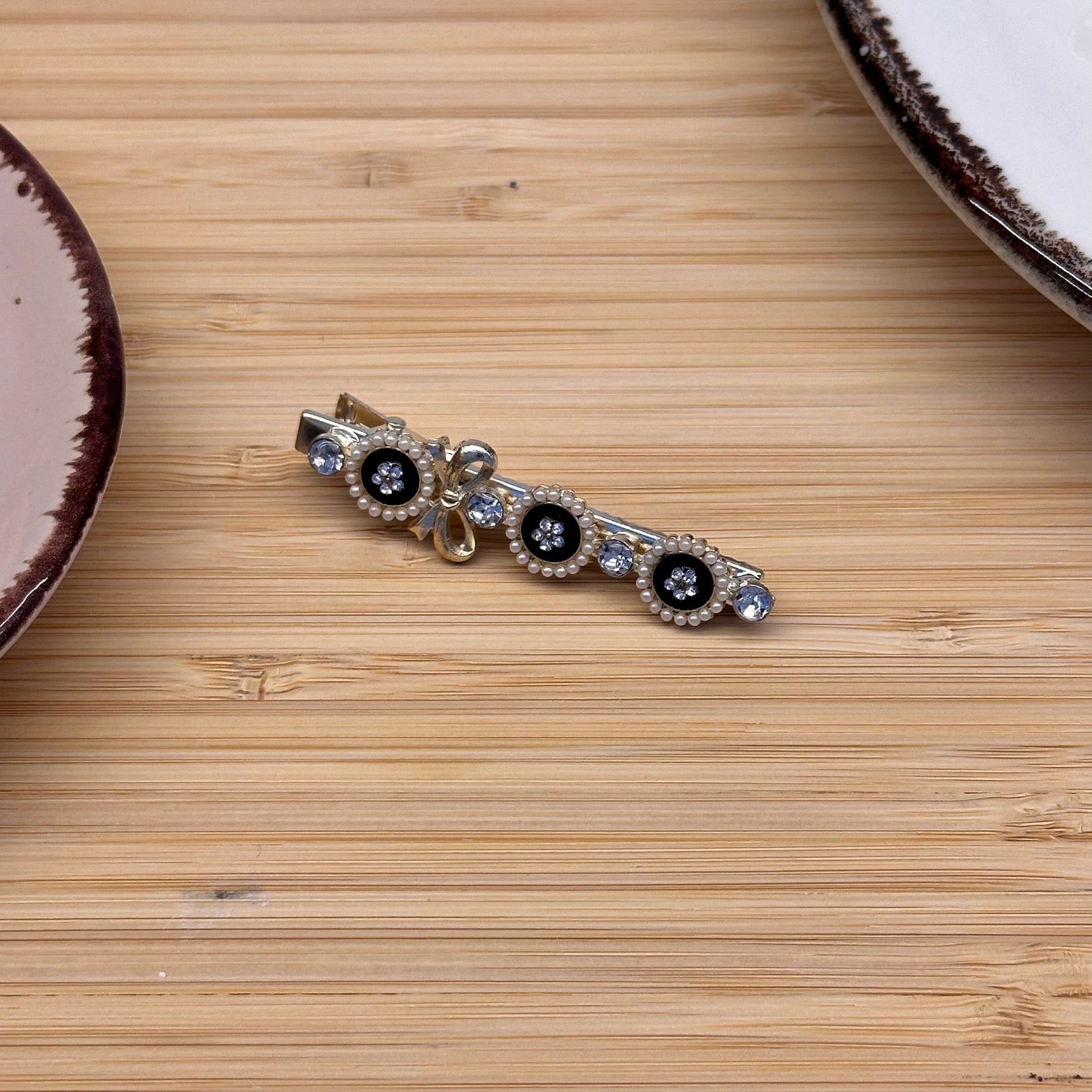 Plaukų aksesuaras segtukas "gėlytės" su blizgučiais juoda - plaukuota-segtukai