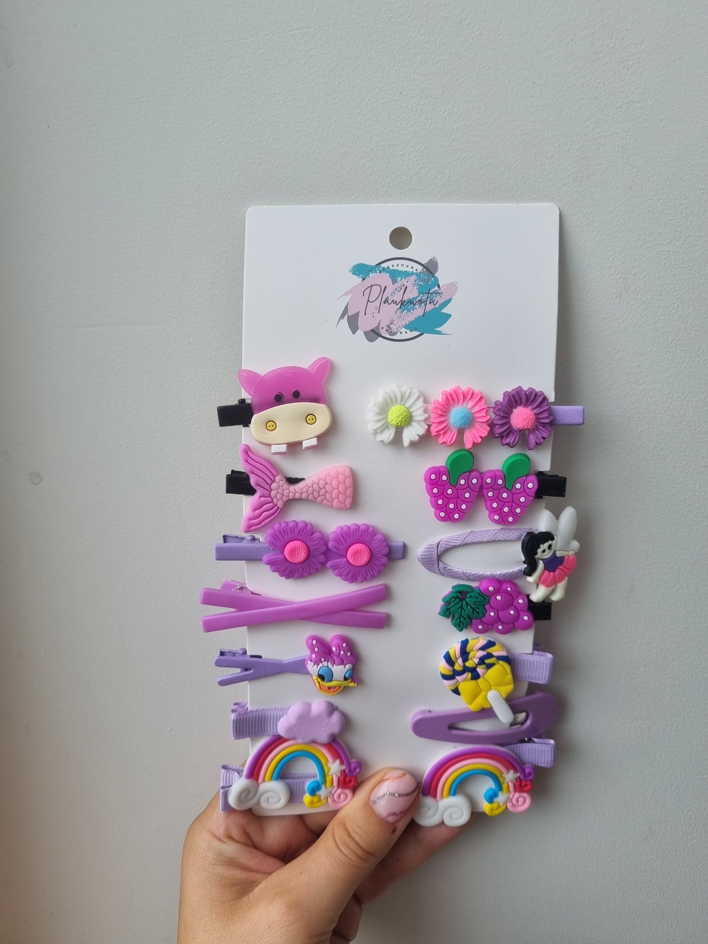 Violetinių spalvų  ir žaismingų segtukų vaikams rinkinys