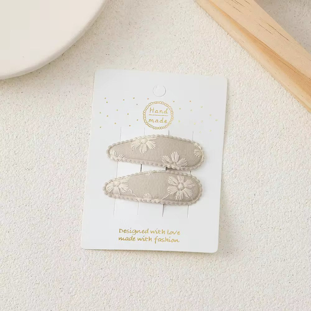 Rankų darbo pilkos spalvos medžiaginiai segtukai - Plaukuota-segtukai