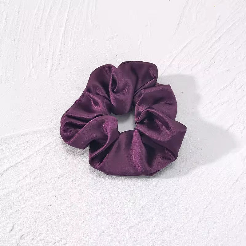 Satino plaukų gumelė violetinės spalvos - Plaukuota-gumelės