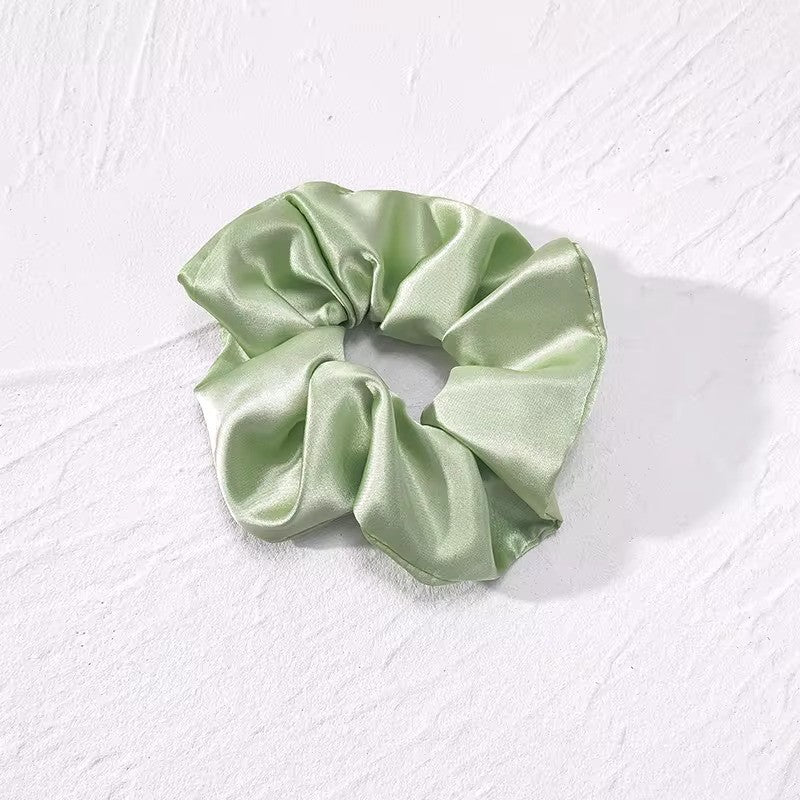 Satino plaukų gumelė žalsvos spalvos - Plaukuota-gumelės
