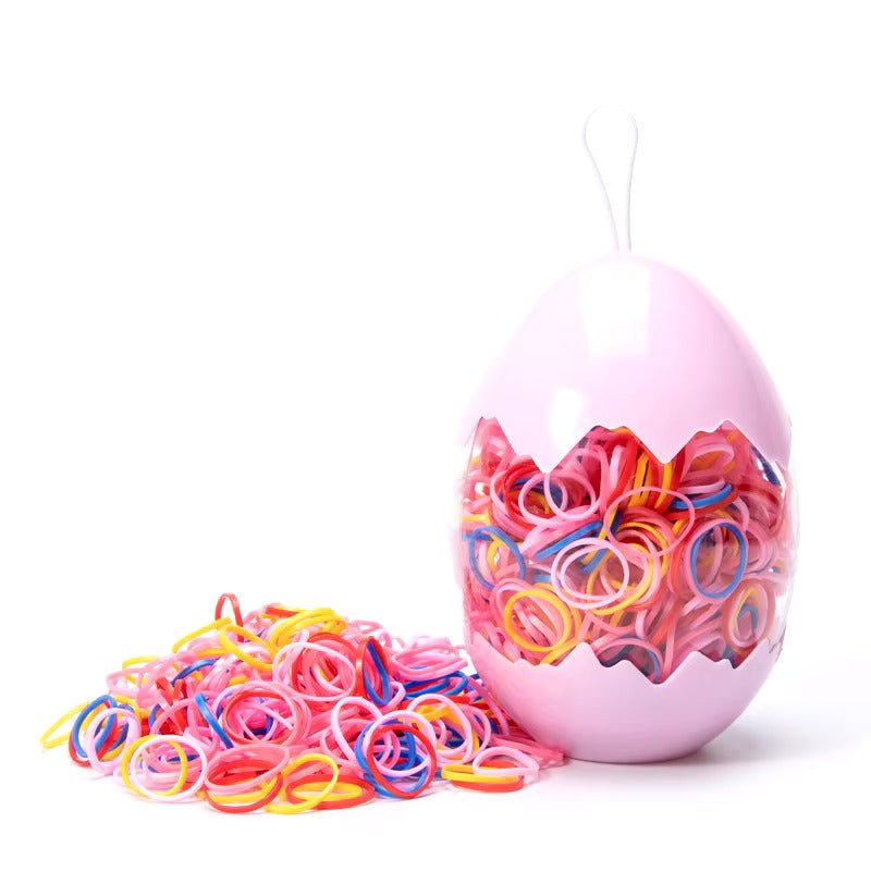 Spalvotos guminės gumytės rūžavame kiaušinio dėkle - Plaukuota - gumelės